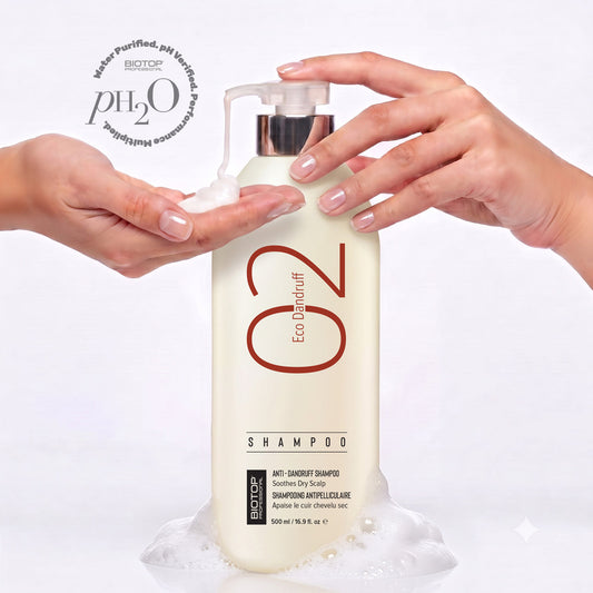 hands lathering Biotop 02 shampoo from a pump bottle